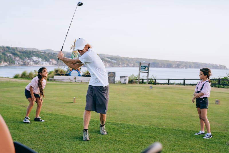 Golfer on an Irish links course at sunset
